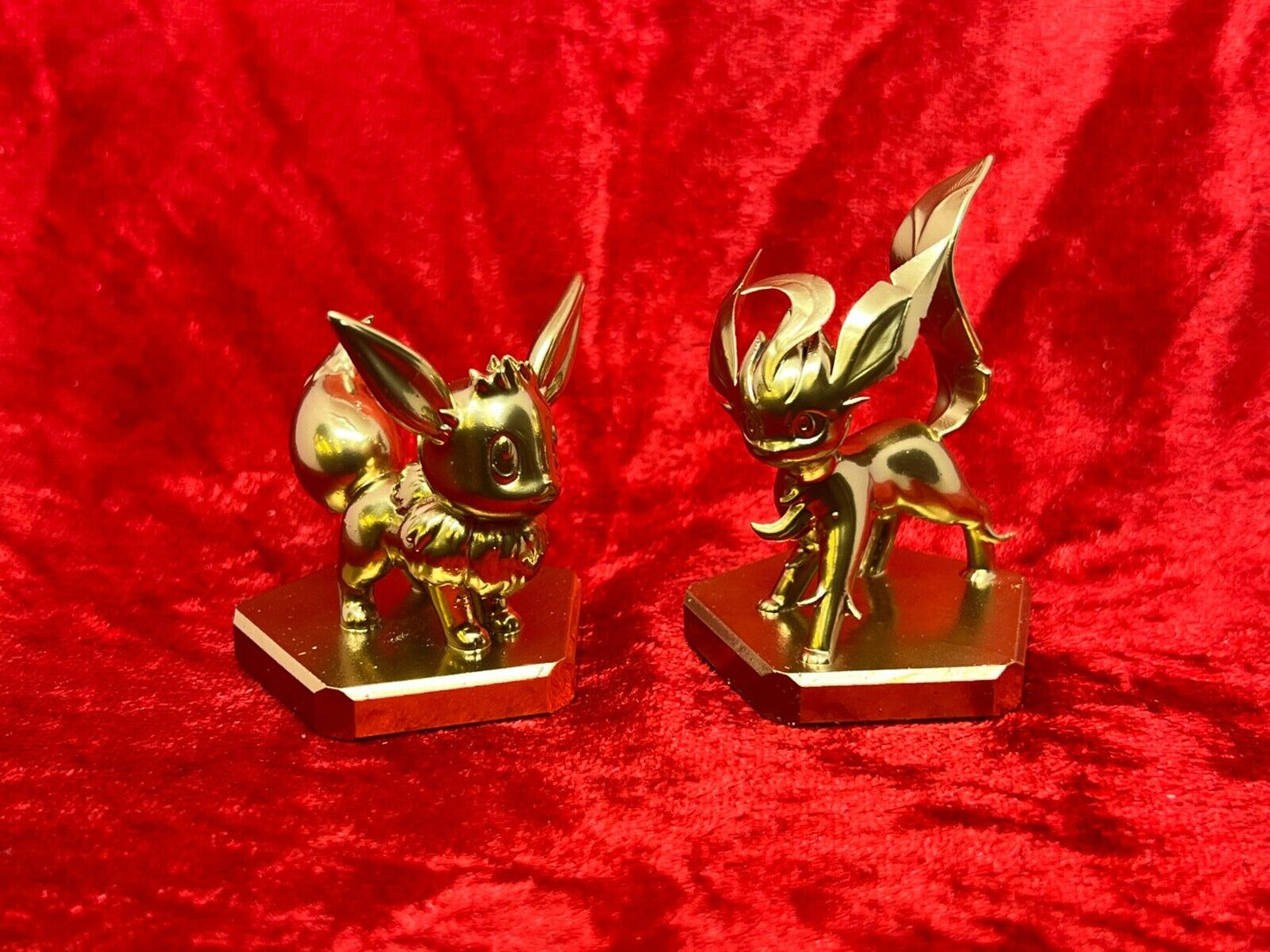 Pokemon #133 Eevee and #470 Leafeon figure Gold TCG Statue