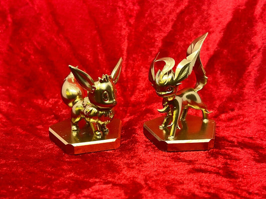 Pokemon #133 Eevee and #470 Leafeon figure Gold TCG Statue