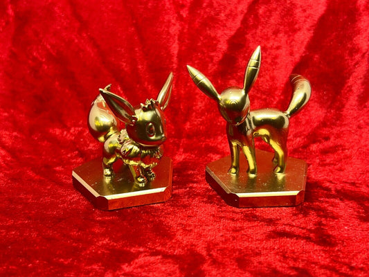 Pokemon #133 Eevee and #197 Umbreon figure Gold TCG Statue