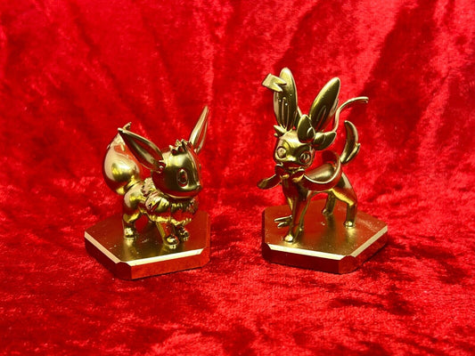 Pokemon #133 Eevee and #700 Sylveon figure Gold TCG Statue